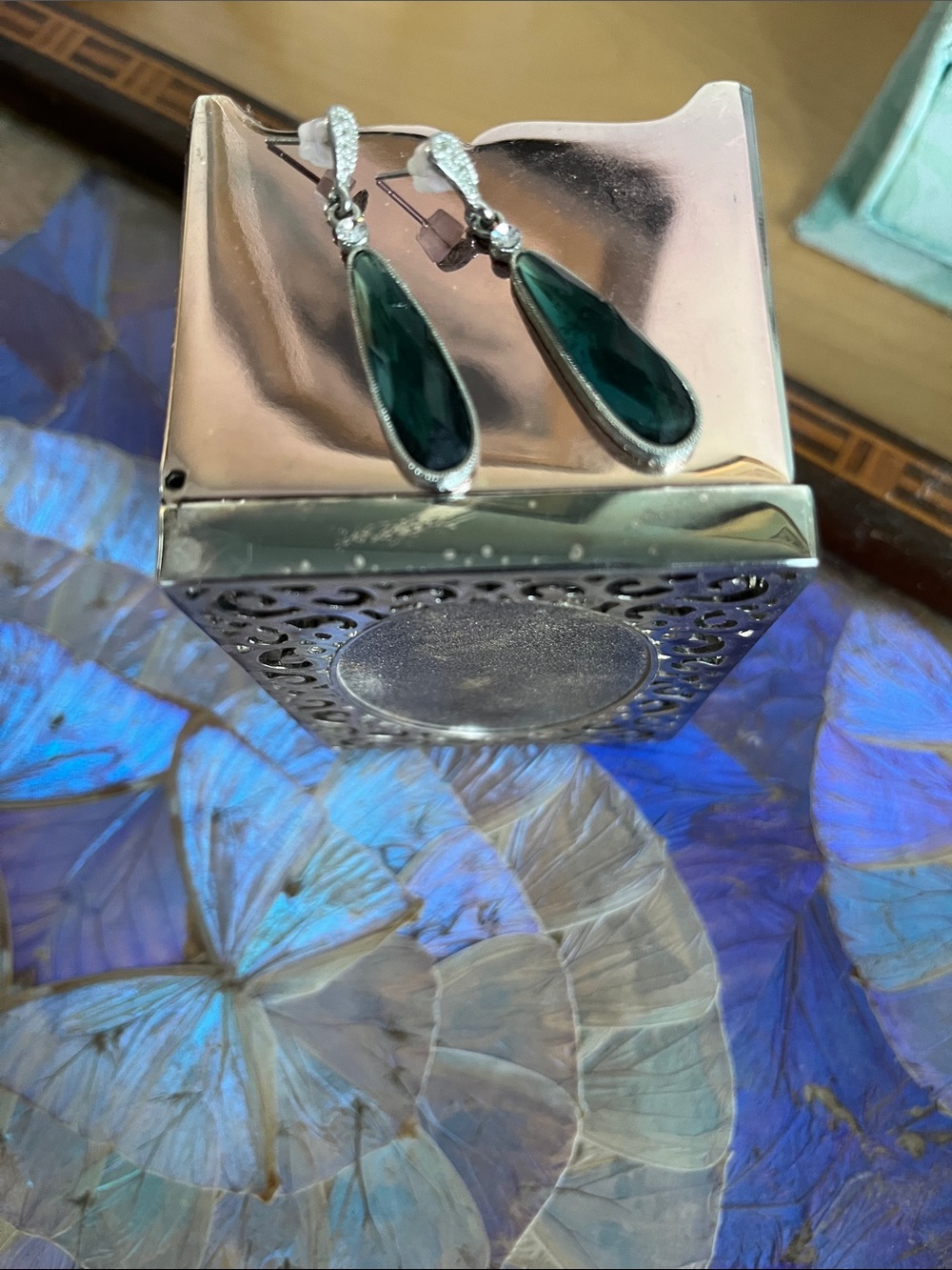 Teal glass silver tone 
Teardrop Dangle Earrings